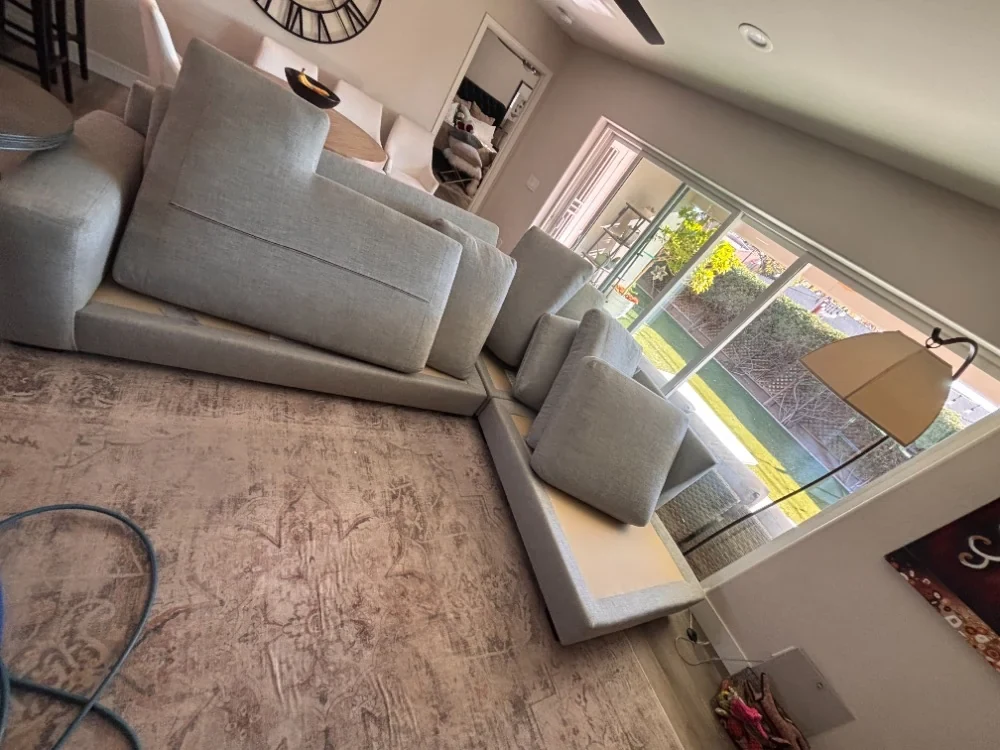 Large fabric sectional in a Paradise Valley home prepared for cleaning